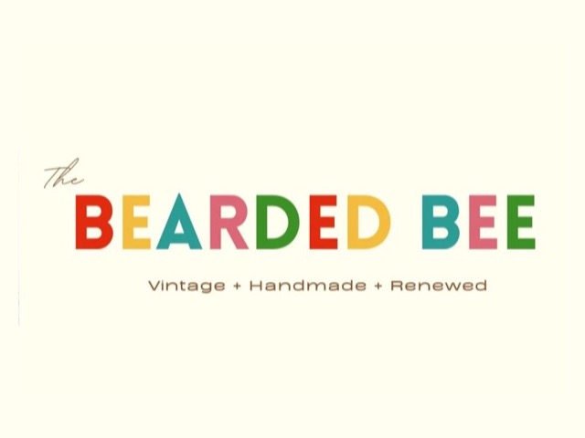 The Bearded Bee multicolor wordmark.